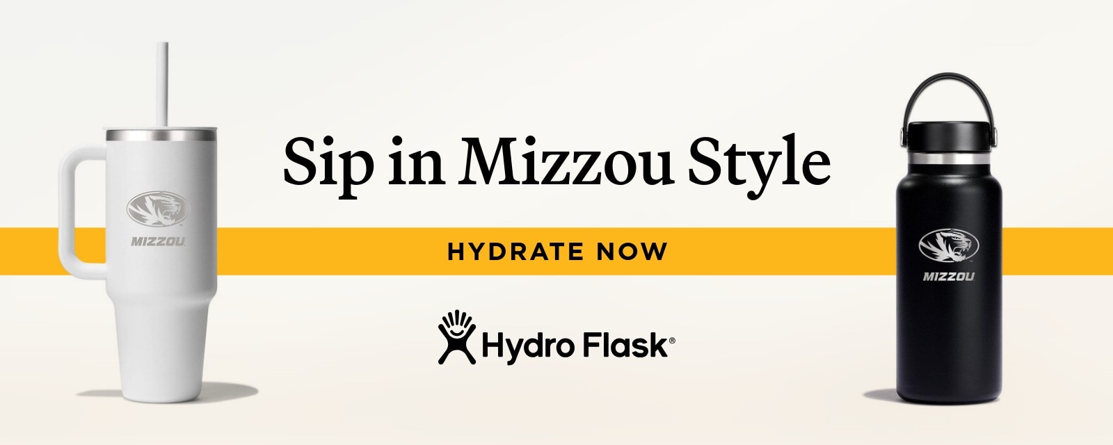 Hydro Flask promotion banner showing two white and black Mizzou-branded bottles with the text “Sip in Mizzou Style” and a yellow bar reading “Hydrate Now.” Hydro Flask logo appears below.